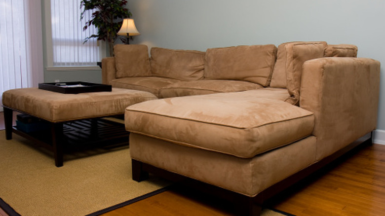 A suede sofa in a contemporary living room