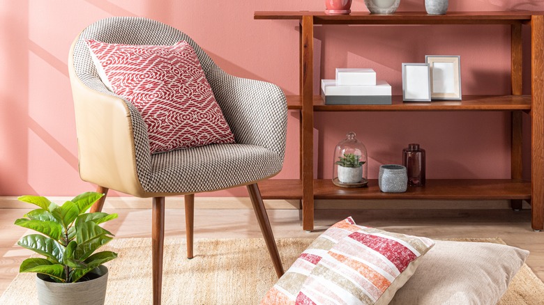 Accent chair in pink room