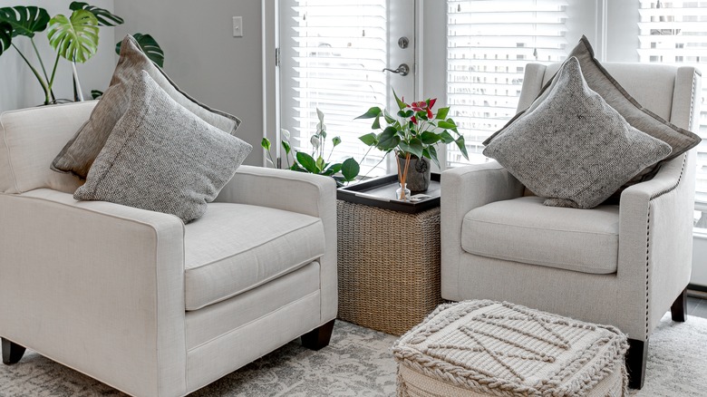 Two white accent chairs 