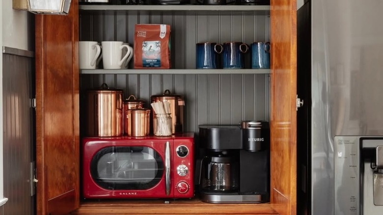 dark charcoal grey beadboard backsplash with retro appliances