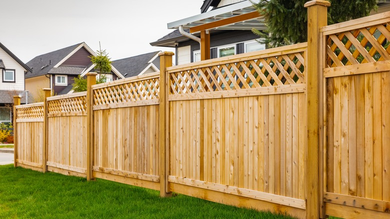 wooden fence in between houses 