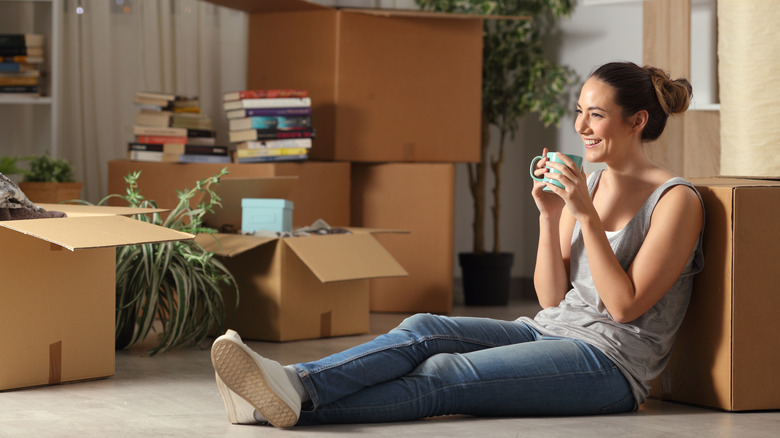 Woman holding cup of coffee