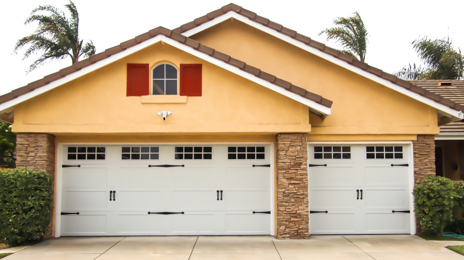 Tips For Resetting A Garage Door (& Adding Remotes To An Older System)