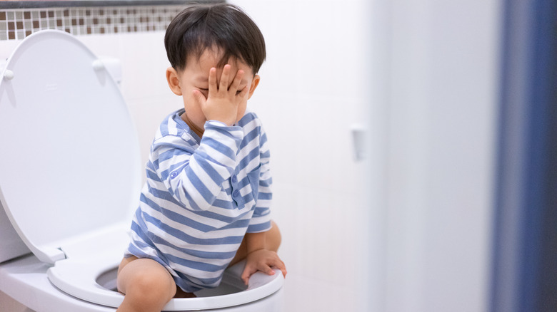 little boy on toilet