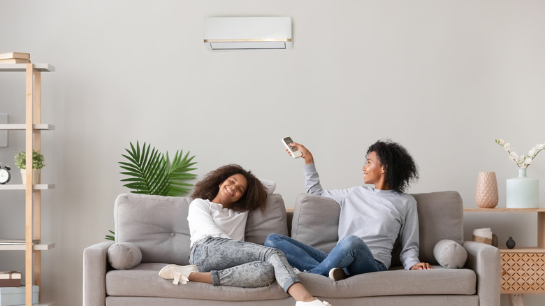 Family enjoying air conditioner