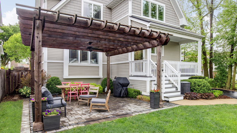 pergola with chairs