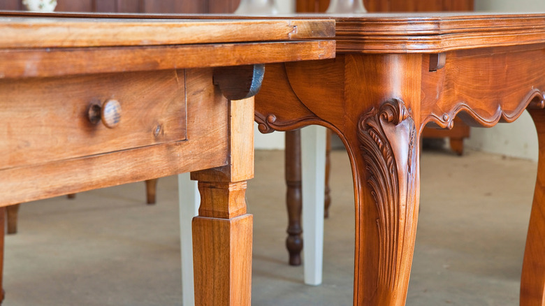Wood tables with carved details