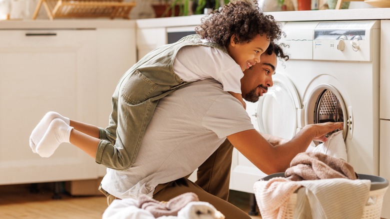 family doing laundry together 