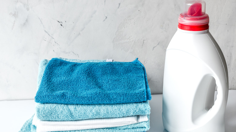 laundry detergent and towels 