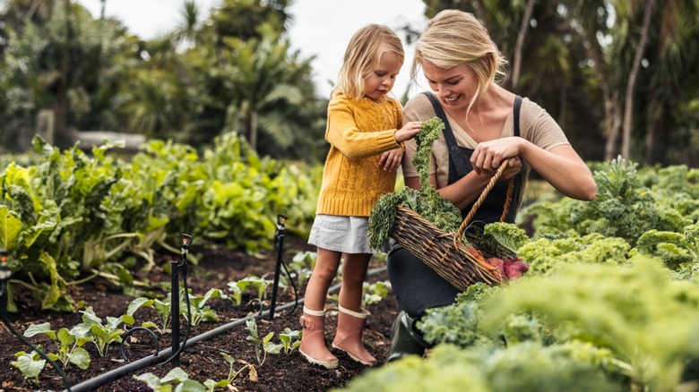 Woman and child in garden
