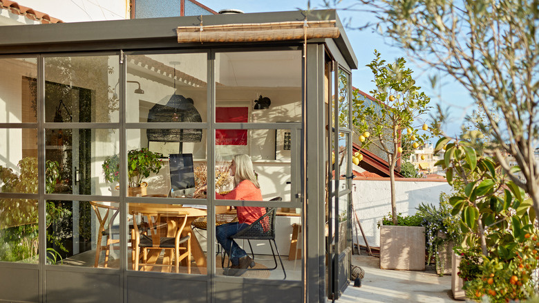 exterior of woman in sunroom