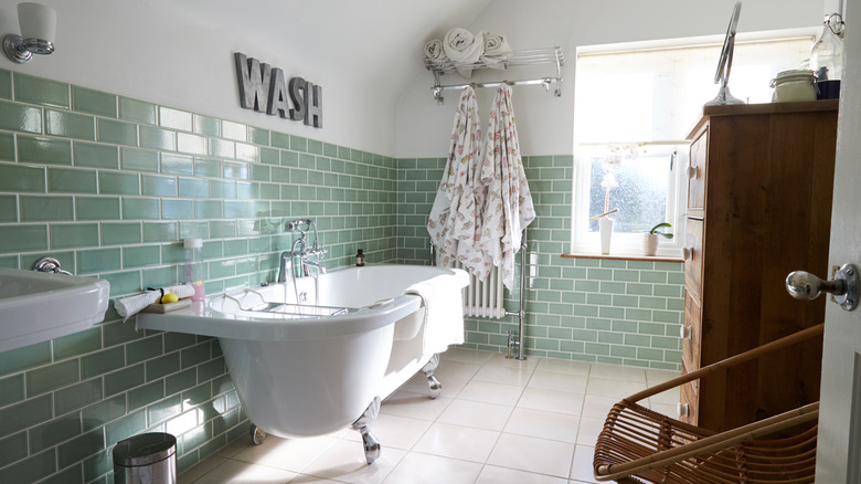 bathroom with cool green tiles