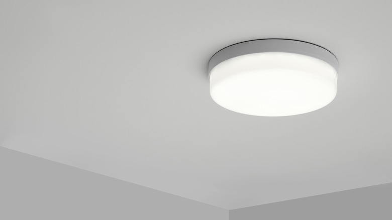 White flush mount lamp on ceiling