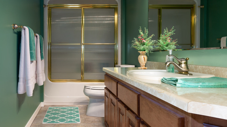 Guest bathroom with branch decor