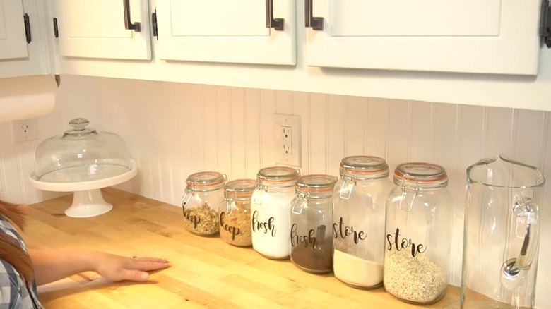 white wood paneling in kitchen