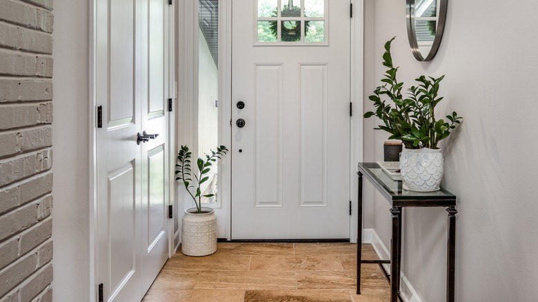 Narrow hallway in modern tones