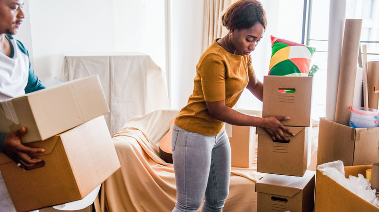 People organizing boxes of items
