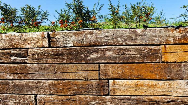Railroad tie retaining wall