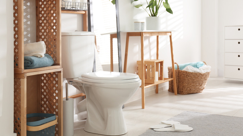 white and wooden cozy bathroom 