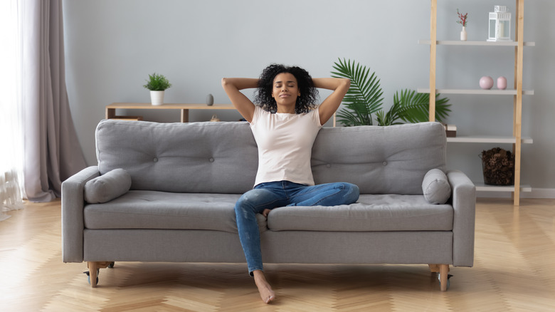woman relaxing on the couch