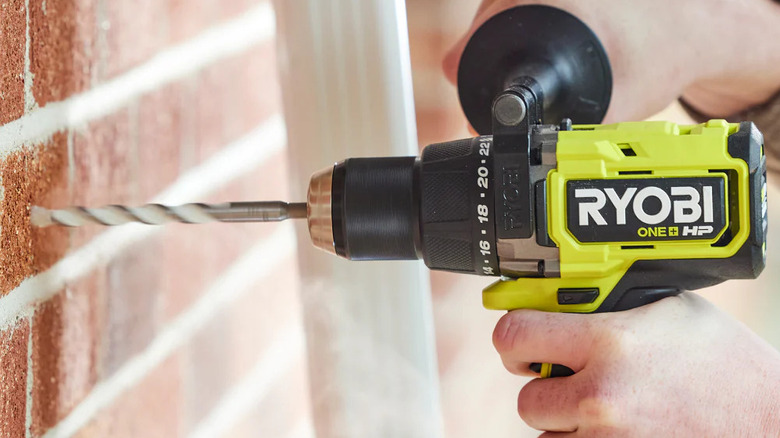 The Ryobi hammer drill can punch through masonry and concrete