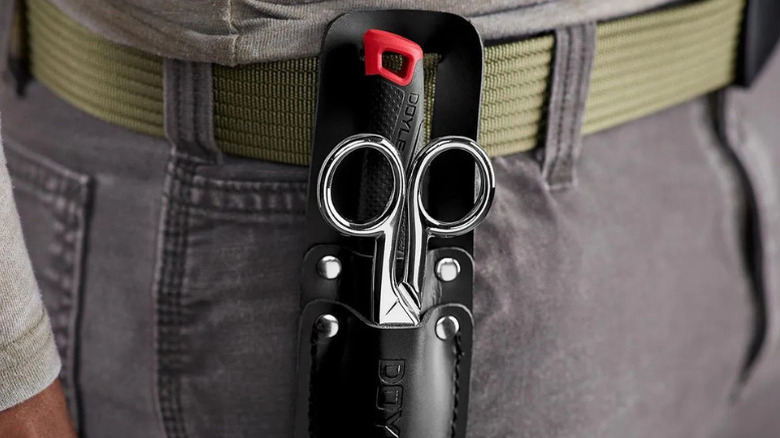 Doyle's Cable Splicing Kit mounted on a worker's belt