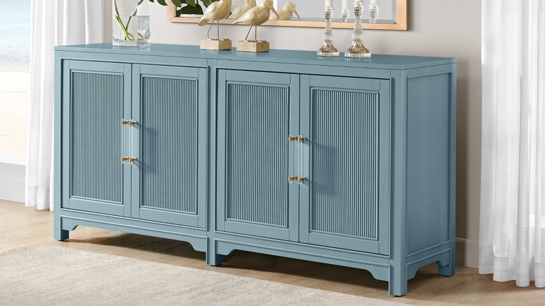 Bayside Furnishings Keeley Accent Cabinet sitting in an entryway below a mirror