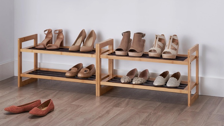 Trinity Bamboo Shoe Racks side-by-side in entryway stacked with shoes
