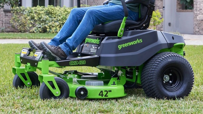 Man riding a Greenworks riding lawn mower