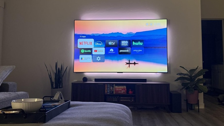 TCL's 75-inch QM6K Series Smart TV in a living room