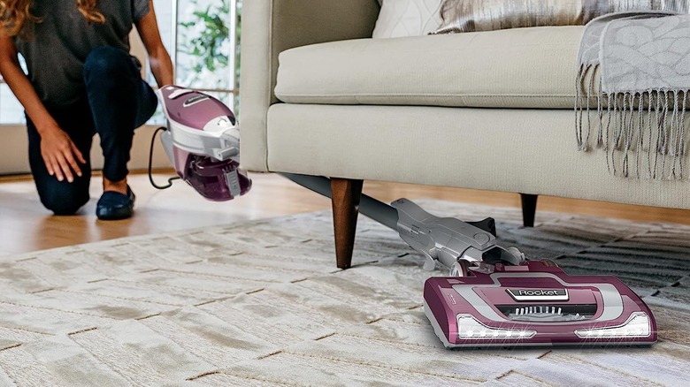 purple vacuum under couch