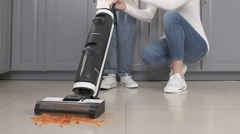 boy and mother vacuum spaghetti