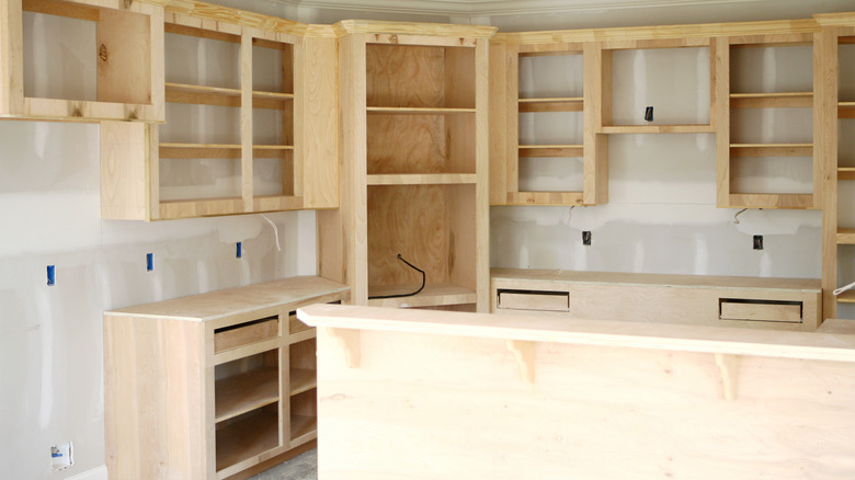 Light wood stock kitchen cabinets