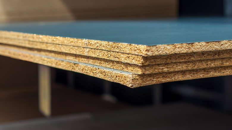 Close up of stacked particleboard