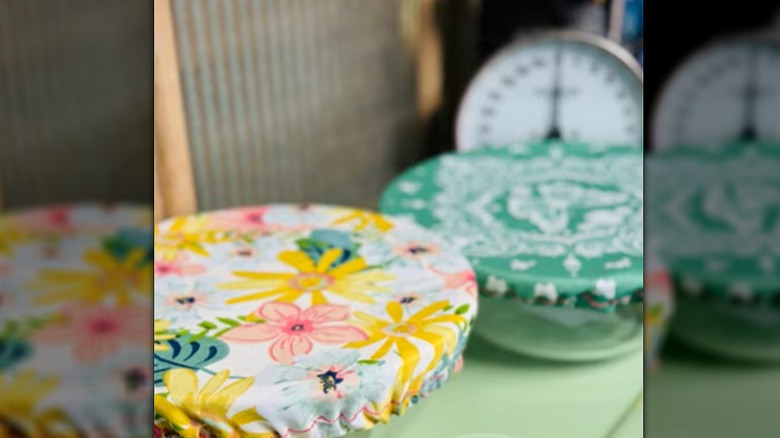 Sewing elastic around the edges of a circle cut from a bandana makes a bowl cover