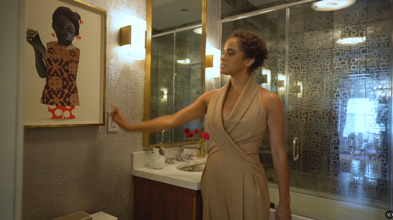 metallic guest bathroom with mirrors