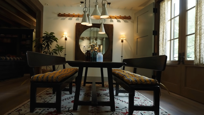 dining room with mirror
