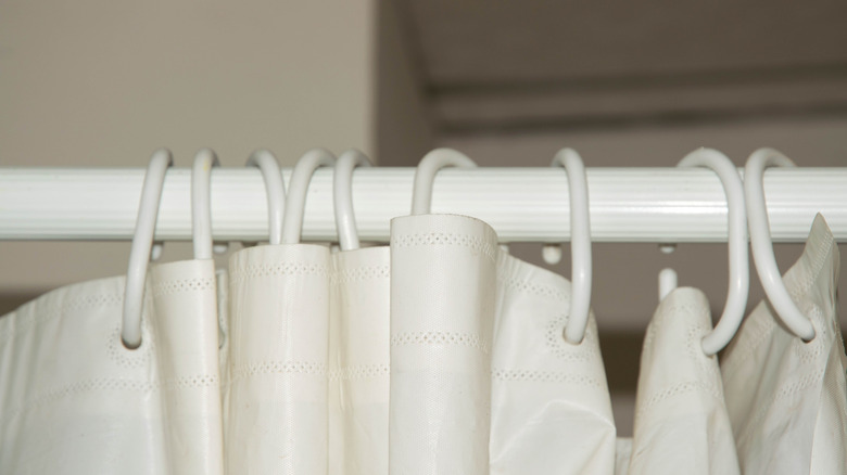 shower curtain hanging on rod