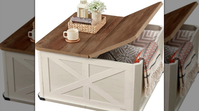 Vasagle coffee table with storage partially open