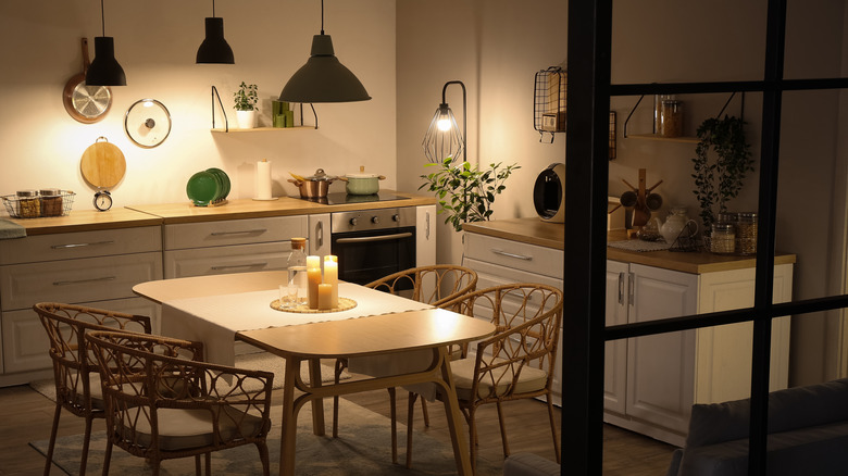 A modern kitchen with lamp lighting.