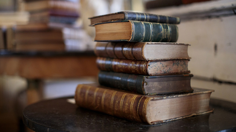 A stack of old leather books