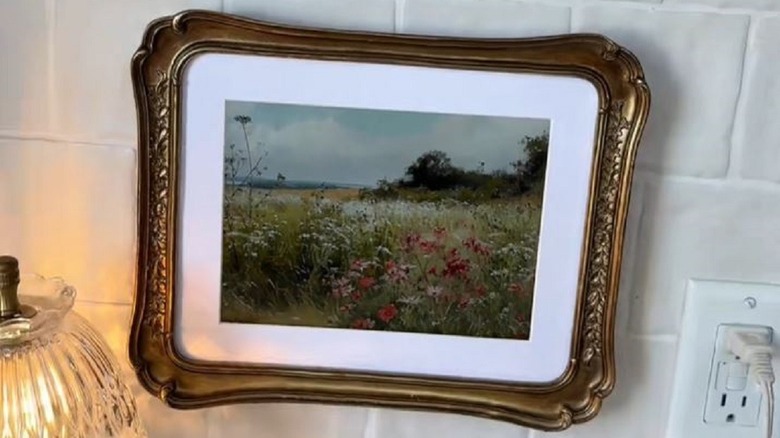 Old tablet turned into kitchen TV wall art