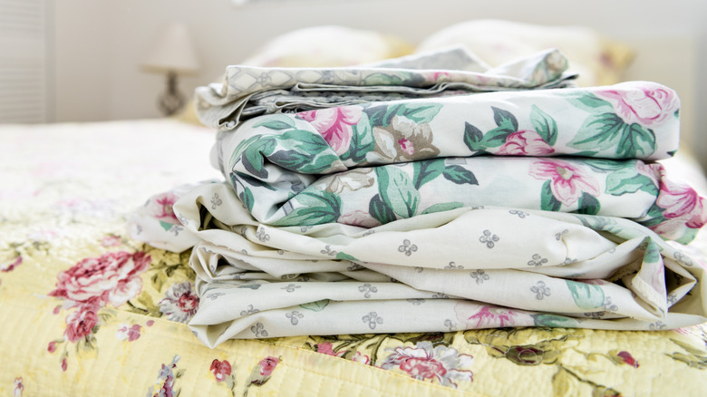 stack of pretty vintage sheets
