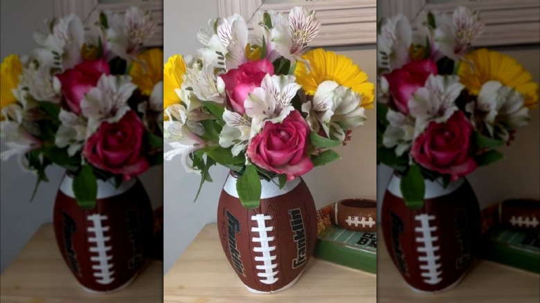Flower vase made from old football