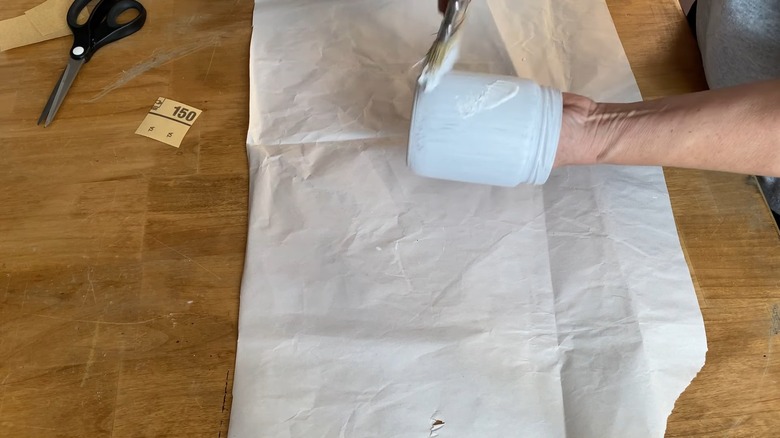 Hand painting a glass jar white