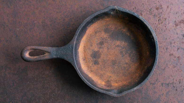 Cast iron pan with light brown stains
