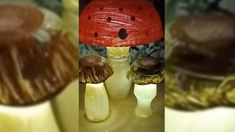 Three glowing glass mushroom decorations