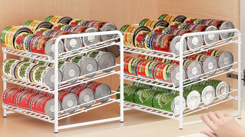 White metal canned goods on cabinet dispensers