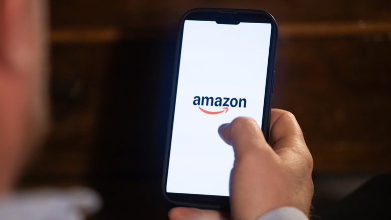 Person opening the Amazon mobile app