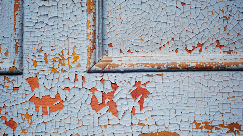 Chipped paint covering a front door